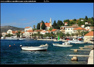 auf der Riva mit ihrer Palmenpracht und den schönen mediterranen Häusern