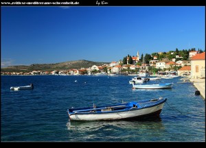 auf der Riva mit ihrer Palmenpracht und den schönen mediterranen Häusern